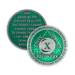 Green 10 year AA sobriety coin featuring the three legacies, serenity prayer, and "To Thine Own Self be True."