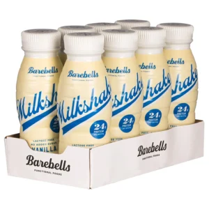 Eight bottles of Barebells vanilla flavored protein milkshake, a lactose-free high protein drink with no added sugar.