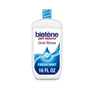 A 16 fl oz bottle of biotène Fresh Mint mouthwash provides relief from dry mouth symptoms and freshens breath.