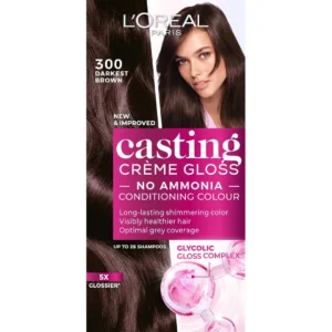 L'Oréal Paris Casting Crème Gloss 300 Dark Brown hair dye provides natural-looking color, shimmering tones, and lasts up to 28 shampoos, while the coconut oil conditioner nourishes hair.
