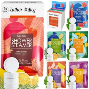 This image shows a beautifully packaged set of 24 aromatherapy shower steamers, infused with 100% pure essential oils in six unique scents, designed for a relaxing and rejuvenating spa-like shower experience.