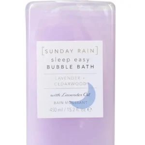 Sunday Rain Sleep Easy bubble bath with lavender and cedarwood provides a calming and moisturizing vegan bath soak for deep relaxation.