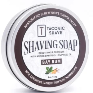 Taconic Shave Bay Rum shaving soap puck with warm, spiced aroma provides a thick and slick lather for a classic wet shave experience.