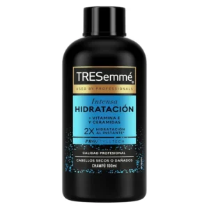 Bottle of TRESemme shampoo for professional-quality hair care and beautiful styling.