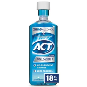 This image shows an 18 oz bottle of Act Anticavity Arctic Blast Mouthwash, a dentist-recommended fluoride treatment that strengthens tooth enamel and helps prevent cavities.