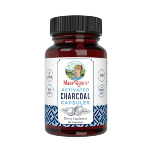 Bottle of activated charcoal capsules made from coconut shells, a vegan and non-GMO supplement to alleviate gas and bloating.