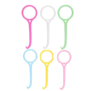 This image shows a six pack of Kaxilu aligner removal tools in different colors, designed to gently and effectively remove dental retainers and aligners like Invisalign without damaging gums, featuring a grip ring and non-slip case.