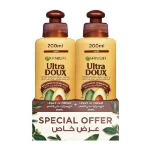 Garnier Ultra Doux leave-in cream with avocado oil and shea butter deeply nourishes and hydrates hair, protecting it from heat for smooth, shiny, and manageable styles.