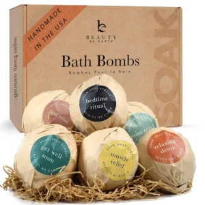 This USA-made bath bomb gift set features six organic and natural bath fizzies with essential oils, Epsom salt, clays, and butters, perfect for a relaxing spa experience for women, men, and kids.
