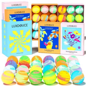 A vibrant set of 24 LUXDOUCE bath bombs in 12 assorted floral and fruity scents, including lavender, rose, jasmine, eucalyptus, watermelon, and orange, promising a cruelty-free and skin-soothing bath experience.