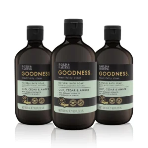 Three bottles of Baylis & Harding Goodness Oud, Cedar & Amber bath soak, a vegan-friendly and dermatologist-approved formula made with 98% naturally derived ingredients.