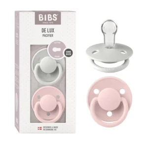 BIBS De Lux pacifiers in blossom and haze colors, designed and manufactured in Denmark with a matte finish and recommended by midwives to support natural breastfeeding.