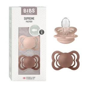 This 2-pack of BIBS Supreme soothers in Woodchuck and Blush, size 1 for babies 0-6 months, features a symmetrical nipple, reversible design, and ventilated shield.