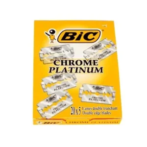 A close-up shows the sharp edge of a BIC Chrome Platinum double edge safety razor blade, known for its durability and precision shave, individually wrapped for hygiene.