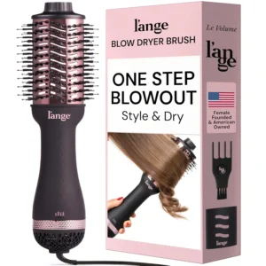 Black 2-in-1 blow dryer brush with oval barrel for creating smooth, frizz-free hairstyles with volume on all hair types.