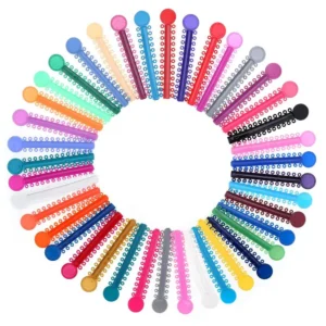 Multicolored orthodontic ligature ties and O-rings elastic bands for braces, made of hypoallergenic material with good elasticity, used for dental orthodontic treatment.