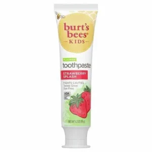 Burt's Bees strawberry flavored toothpaste in a tube, formulated with fluoride for kids' dental health.