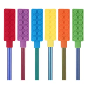 This image displays a six-pack of colorful, chewable pencil toppers made from food-grade silicone, designed to provide oral sensory stimulation for children with autism, ADHD, or special needs, helping to prevent chewing on clothing or other items.