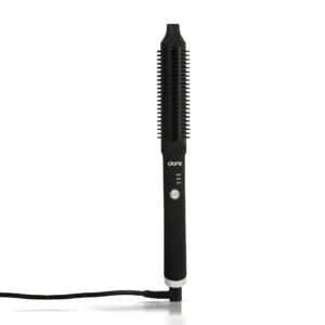 Black Clara ionic hot brush with three heat settings, designed to prevent frizz and style all hair types into blowouts, curls, or straight looks.