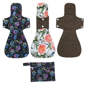 Three 16 inch reusable cloth menstrual pads with a colorful flower pattern and a small wet bag for storage.