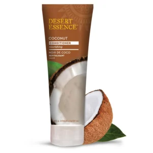 A bottle of Desert Essence Coconut Conditioner designed to deeply moisturize, smooth frizz, and restore shine to dry, nourished hair with organic coconut oil, olive leaf, and nettle.