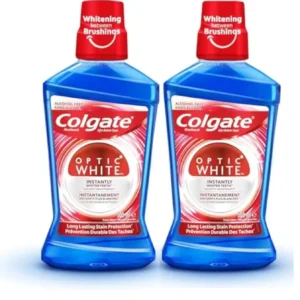 Two bottles of Colgate Optic White whitening mouthwash provide alcohol-free, long-lasting protection for a whiter smile.