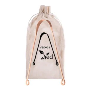 A copper tongue scraper efficiently removes bacteria and white coating for fresher breath and improved oral health.