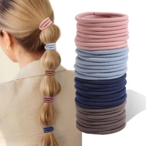 A 40-piece set of natural-colored, durable and seamless cotton hair ties for women, designed to gently secure ponytails without causing creases or damage.