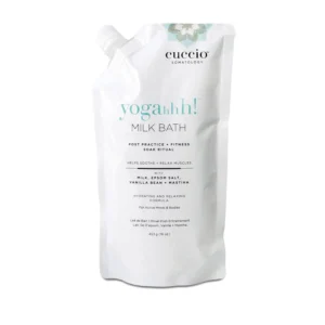 Cuccio Somatology milk bath soaking in water helps relieve sore muscles and hydrate dry skin for full body wellness and relaxation.