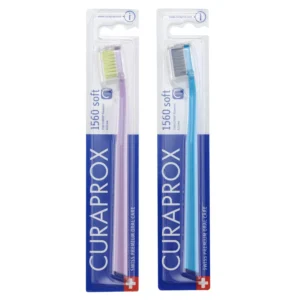 This is a two-pack of Curaprox CS 1560 soft toothbrushes in assorted colors, designed with soft bristles and an ergonomic handle for comfortable and effective cleaning.