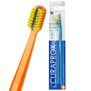 This Curaprox Ortho toothbrush features a brace bracket groove, 5460 CUREN bristles, and an octagonal handle for a precise cleaning angle, perfect for orthodontic care.