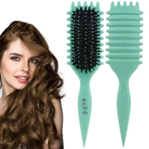 Green curl defining brush for styling, detangling and shaping curly hair on wet or dry hair.