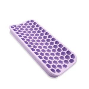 Purple silicone curling iron pad provides a heat resistant and non-slip surface for hot hair styling tools, protecting countertops from damage.