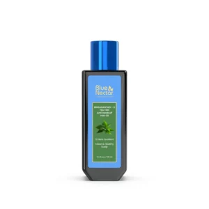 Blue Nectar Ayurvedic anti dandruff hair oil with tea tree and neem helps soothe itchy scalp, reduce flakes, and nourish hair, leaving it stronger and shinier.