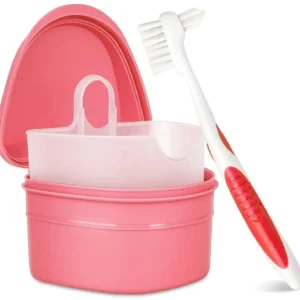 Pink denture cleaning set with a denture brush and soaking case with strainer basket for cleaning full or partial dentures, retainers and mouth guards.