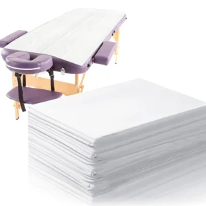 These white disposable bed sheets, measuring 31 x 71 inches, offer waterproof protection for massage tables and are made from soft, non-woven fabric.