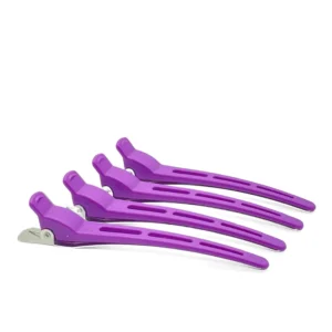 This image shows four purple duck bill hair clips with metal base for women styling, providing extra strong grip for sectioning and cutting hair.