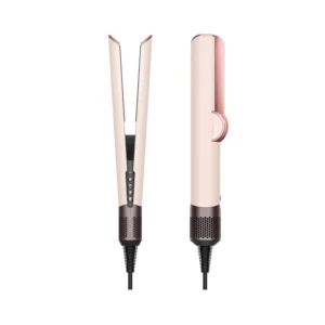 The Dyson Airstrait in Ceramic Pink uses a powerful air blast to smooth and straighten hair from wet to dry without hot plates or heat damage, simplifying your hair routine and creating volume.