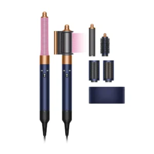The Dyson Airwrap styler in Prussian Blue and Copper uses Coanda airflow and intelligent heat control to curl, smooth, and dry hair without extreme heat damage.