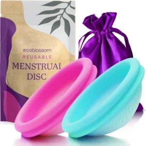 This image shows a set of two small Ecoblossom reusable menstrual discs made from soft, medical-grade silicone, designed for leak-proof period protection and comfortable use for women with light or heavy flow.