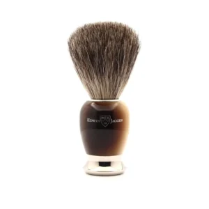 The Edwin Jagger pure badger shaving brush with horn-effect handle creates a rich lather for a close, comfortable wet shave, gently exfoliating the skin.