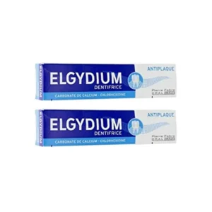 Two 75ml tubes of Elgydium anti-plaque toothpaste for adults, formulated with calcium carbonate to help prevent plaque buildup with regular brushing.