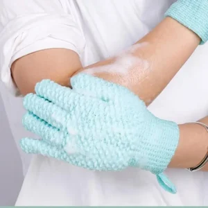 A pair of green exfoliating gloves for shower and body scrubs, with a hanging loop.