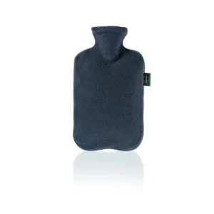 A white fleece cover on a Fashy hot water bottle made from thermoplastic material with a 2-liter capacity.