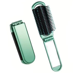 Green folding hair brush with mirror, a mini pocket comb with soft nylon bristles, is a compact travel hair styling tool perfect for on-the-go styling.