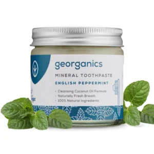 Georganics natural toothpowder in a glass jar, a vegan and cruelty-free stain-removing formula handmade in the UK.