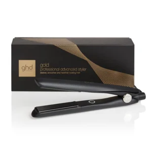 A black GHD Gold Hair Straightener uses dual-zone technology and heat sensors for consistently smooth, healthy hair at 185°C.