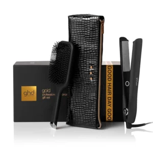 The ghd Gold Styler professional hair straightener giftset features dual-zone ceramic heating for smooth, healthy-looking hair with versatile styling and includes a brush and heat-resistant storage.