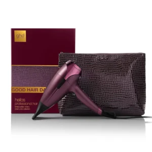 ghd Helios professional hairdryer in cherry chic bordeaux color, featuring a concentrator nozzle and comes with a matching storage pouch, powered by a 2200W brushless motor for ultra-fast drying and exceptional shine thanks to ionic technology.