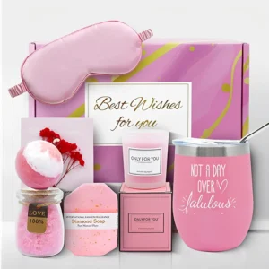 This spa gift basket for women includes a wine tumbler, scented candle, bath bomb, and greeting card for a relaxing self-care experience.